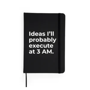 Agendă neagră cu mesaj „Ideas I'll probably execute at 3 AM.”
