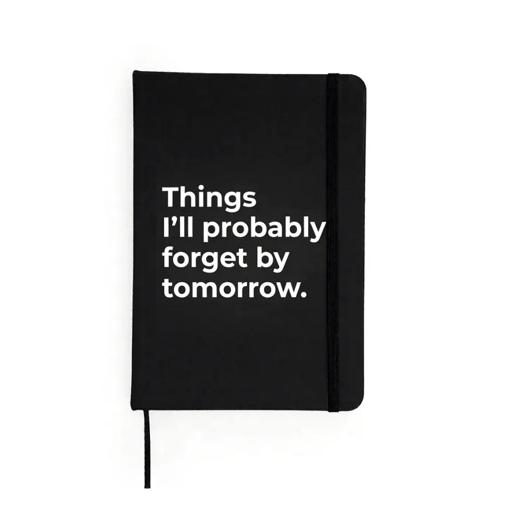 Agendă neagră cu mesaj „Things I’ll probably forget by tomorrow”